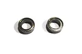Two small silver metal ball bearings shown side by side against a plain white background.