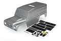 A grey painted Land Rover Defender RC body shell for the Traxxas TRX-4, shown with an included decal sheet on a white background.
