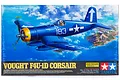 Tamiya 1/32 scale Vought F4U-1D Corsair plastic model kit box art showing a blue fighter plane flying over a tropical island.