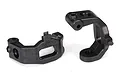 Two black plastic Traxxas front caster blocks for RC cars, shown from different angles on a white background.