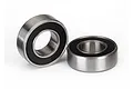 Two Traxxas 6x12x4mm rubber shielded ball bearings shown against a plain white background.