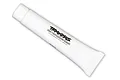 A white squeeze tube of Traxxas Premium High Performance Grease against a white background.