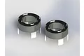 Two ARRMA metal shielded ball bearings shown in a studio render against a white background.