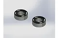 Two ARRMA metal shielded ball bearings shown in a studio product render against a plain light grey background.