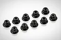 Ten black steel flanged serrated nyloc wheel nuts arranged in a grid on a white background.