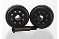 Two black plastic RC wheelie bar wheels and a single metal axle screw on a white background.