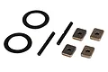Traxxas differential hardware set including two washers, two pins, and four small metal plates on a white background.