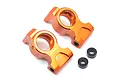 Two orange anodized aluminium rear hub carriers for HPI RS4 RC cars, with two small black spacers included.