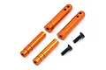 A set of four orange anodized aluminium battery posts and two black countersunk screws for an RC car on a white background.