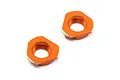 Two orange anodized aluminium bearing hubs for HPI Sprint 2 RC cars, shown from a top-down angle on a white background.