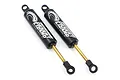 Two black Yeah Racing Desert Lizard internal spring shock absorbers for 1/10 RC cars, featuring gold shafts and black rod ends.