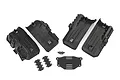 A set of four black plastic inner fender wells for a Traxxas TRX-4 RC crawler, including mounting hardware and brackets.