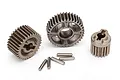 A set of three metal transmission gears and five small metal pins for a Traxxas TRX-4 RC vehicle.