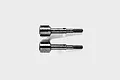 Two Tamiya metal long wheel axles for RC cars shown against a plain white background.