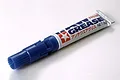A 3g tube of Tamiya Anti-Wear Grease with a blue plastic applicator tip, set against a plain white background.