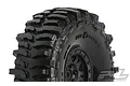 A close-up of a Pro-Line 1.9 inch Interco Bogger rock crawler tire mounted on a black Impulse internal bead-lock rim.