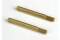 Two gold-colored titanium nitride coated shock shafts for Traxxas RC cars, shown against a plain white background.