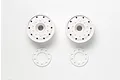 Two white Tamiya 1/14 scale truck rims with matching white hub covers on a white background.