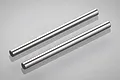Two identical silver-coloured metal shafts laid parallel on a light grey reflective surface.