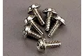 A close-up view of six silver-coloured metal washer head screws with coarse threads, arranged in a small pile on a grey surface.