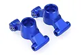 Two blue anodized aluminium RC car rear hub carriers shown from a high angle against a white background.