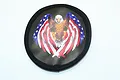 A circular spare tyre cover for 1/10 scale RC crawler wheels featuring a bald eagle graphic with American flag wings on a black background.
