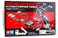Tamiya 1/14 scale electric actuator set packaging box showing the included motor, control unit, wiring, and mechanical assembly components.