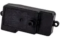 A black plastic radio box cover for an RC car, featuring mounting tabs on the sides and a central antenna mount.