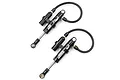 Two black Yeah Racing Desert Lizard 90mm piggyback RC shock absorbers with external reservoirs and black hoses on a white background.