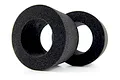 Two black circular foam tyre inserts for RC monster truck wheels, shown against a white background.