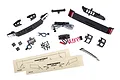 Traxxas TRX-4 Sport LED light kit components including front grille, rear bumper, wiring harness, power module, screws, and installation templates.