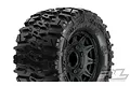 A close-up studio shot of a Pro-Line 2.8 inch Trencher tyre mounted on a black Raid rim, showing the aggressive tread pattern and wheel details.