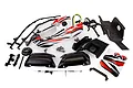 Rovan Baja 5B Shorty Q conversion kit components including a painted body shell, black roll cage parts, chassis plate, and hardware on a white background.