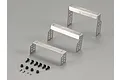 Killerbody stainless steel body mount kit for RC cars including three metal brackets and various screws and nuts on a grey background.