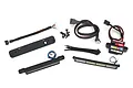 Traxxas X-Maxx LED light bar kit including two light bars, a high-voltage power amplifier, wiring harnesses, mounting plate, screws, and zip ties.