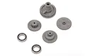 A set of replacement plastic servo gears and two metal ball bearings for a Traxxas RC servo.