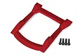 A red Traxxas Rustler 4x4 body roof skid plate shown from a top-down angle with four included black mounting screws.