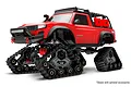 A red Traxxas TRX-4 RC truck equipped with black Traxx All-Terrain track kits instead of wheels, shown against a white background.