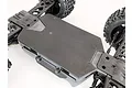 A black T-Bone Racing skid plate installed on the underside of an ARRMA Outcast 4S RC vehicle chassis.