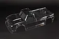An unpainted, clear polycarbonate body shell for an ARRMA 1/7 scale Infraction RC truck, shown from a high angle against a dark background.