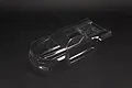 A clear, unpainted polycarbonate RC truggy body shell for an ARRMA Kraton 1/8 scale vehicle, viewed from a high angle against a black background.