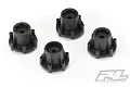 A set of four black Pro-Line 14mm hex wheel adapters for RC cars arranged on a white background.