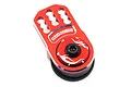 A red anodized aluminium servo horn with a built-in servo saver mechanism, featuring the Yeah Racing logo and multiple adjustment holes.