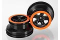 Two black and orange RC short course wheels with a five-spoke design against a white background.