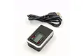 SkyRC GSM-010 GPS speed meter device with a black USB charging cable on a white background.