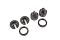 A set of black plastic Traxxas GT-Maxx shock components including two shock caps, two spring retainers, and two threaded adjusting nuts on a white background.