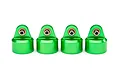 Four bright green anodized aluminium shock caps for Traxxas RC vehicles, arranged in a row against a white background.