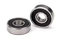 Two Traxxas rubber-shielded ball bearings shown against a plain white background.