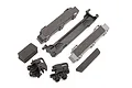 Traxxas Maxx 4S battery mount set including plastic battery trays, foam spacers, and mounting clips on a white background.