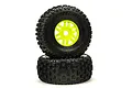 Two ARRMA Fortress SC dBoots tyres mounted on bright yellow multi-spoke rims, stacked vertically against a white background.